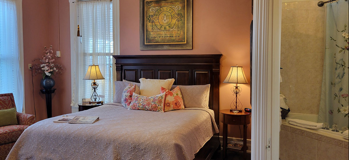 East Chamber bed and view into bath